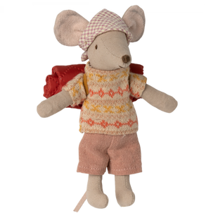 Sentence with replacement: Maileg Hiker Mouse, Big Sister dressed in a sweater and shorts with a cape on the back, part of the hiker collection toys.