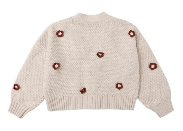 The Rylee & Cru Baby Girls' and Girls' Boxy Crop Cardigan is a beige knit with bubbled sleeves, textured pattern, and red and white flower motifs on the back and sleeves—a cozy addition to any wardrobe.