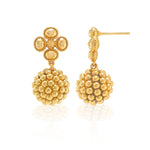 The Juliska Capucine De Wulf Berry Clover Drop Earrings feature a flower-shaped stud and a beaded sphere drop, offering elegant gold berry details—perfect for cocktail attire or adding refined glamour to any look.