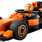 The LEGO® City F1® Driver with McLaren Race Car by Legos - Toyhouse features a bold orange and black race car and includes a minifigure driver with a helmet seated inside.