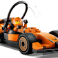 The Legos - Toyhouse LEGO® City F1® Driver with McLaren Race Car features an orange and black Formula 1 car, a minifigure driver with helmet, raised safety halo, and detailed wheels—perfect for fans of racing action.