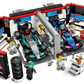 The LEGO® City F1® Garage & Mercedes-AMG & Alpine Cars set by Legos - Toyhouse includes two Formula 1 cars, six minifigures, tools, screens, tires, and decorated garage walls with a racing theme.