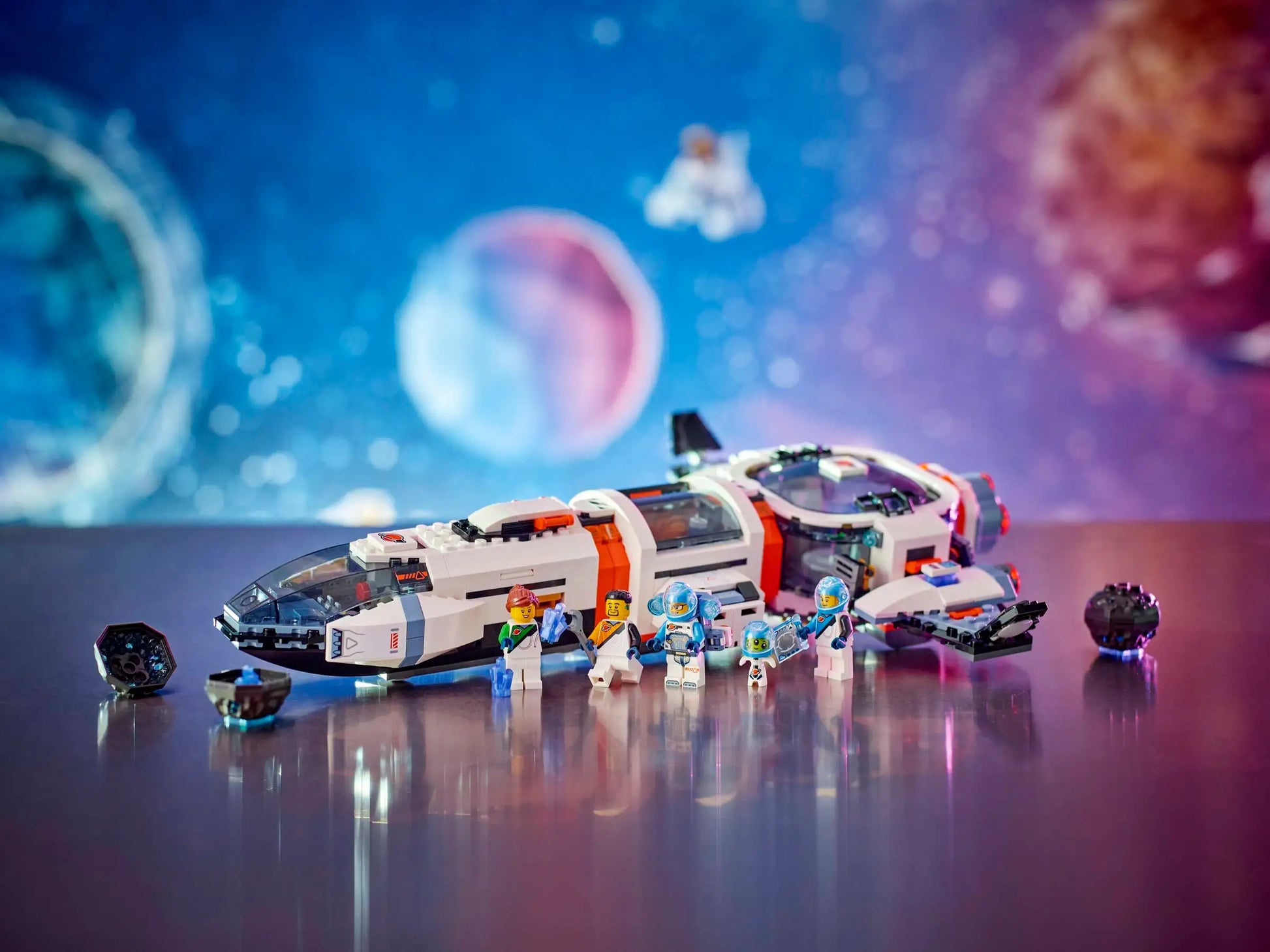 The Legos - Toyhouse LEGO® City Modular Galactic Spaceship set features astronaut minifigures and fun accessories, displayed against a vibrant space background—an exciting outer space toy for kids.