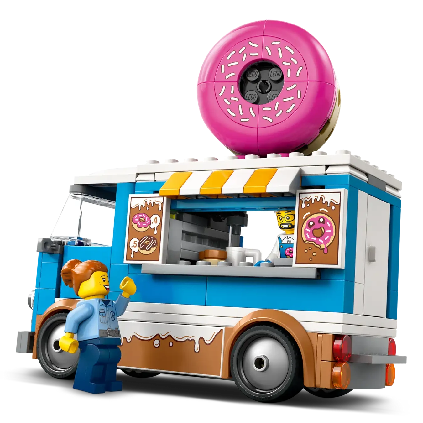 The Legos - Toyhouse LEGO® City Donut Truck features a giant pink donut on top, a serving window, and includes two LEGO figures—one inside the truck and one outside.