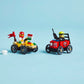 Two race cars from the Legos - Toyhouse LEGO® City Pizza vs. Fire Truck Race Car Pack speed across a blue backdrop—one with a pizza flag and red-helmeted driver, the other with a yellow-helmeted driver and special accessory.