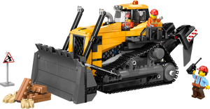 The Legos - Toyhouse LEGO® City Yellow Bulldozer set features a vibrant yellow bulldozer, workers in hard hats, a construction sign, and wooden pieces—ideal for fans of building toys and the LEGO® City Yellow Bulldozer.