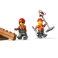 Three construction worker minifigures from the LEGO® City Yellow Bulldozer by Legos - Toyhouse stand by brown bricks; one holds a shovel, another has a roadwork sign, and the third carries a wrench and clipboard.