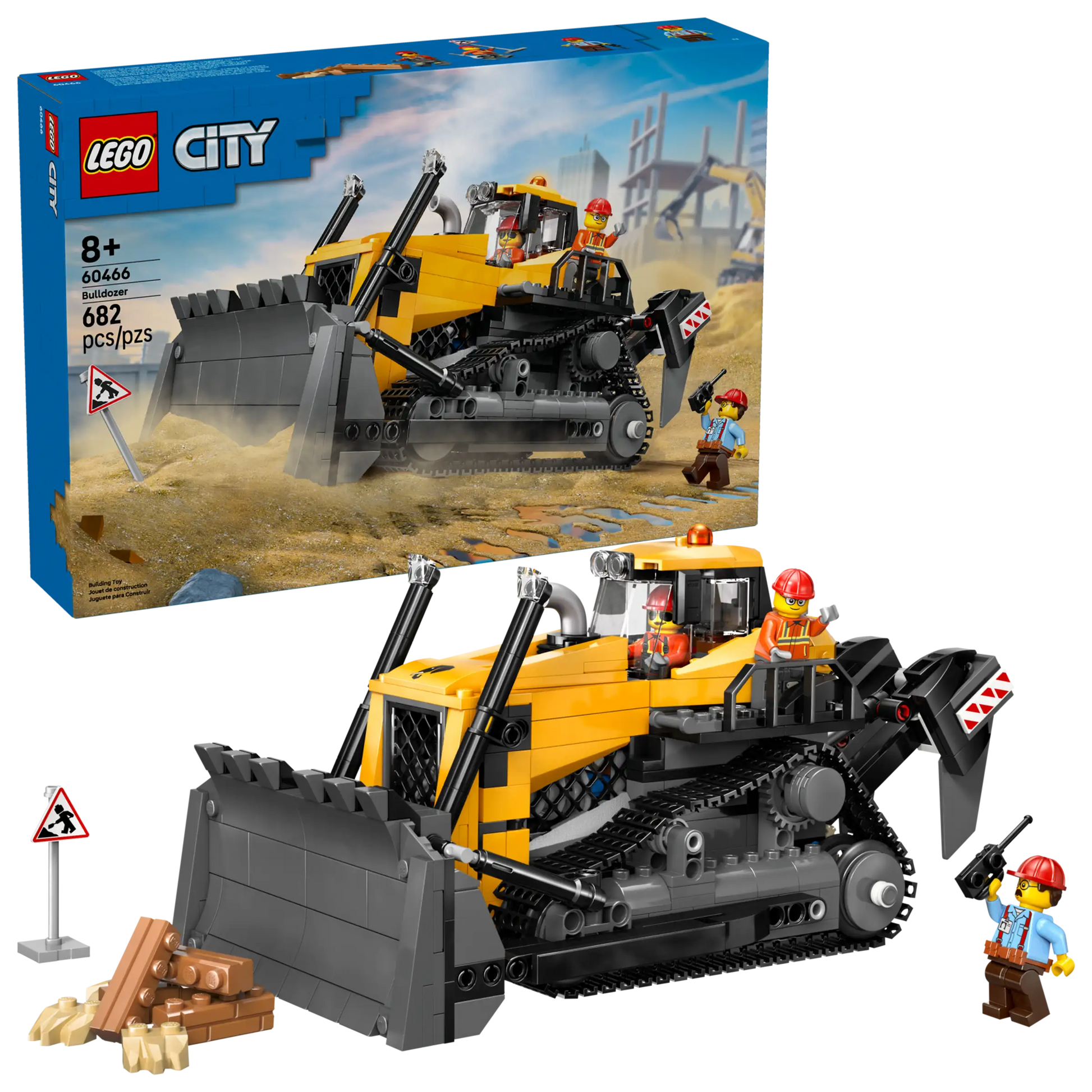 The LEGO® City Yellow Bulldozer by Legos - Toyhouse includes 682 pieces, a large yellow and black construction vehicle playset, two construction worker minifigures, and accessories. Box is visible in the background.