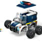The LEGO® City Rides – Police Truck by Legos - Toyhouse includes a police truck with a removable roof, four large wheels, and a police minifigure in a helmet standing beside the vehicle.