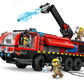 The Legos - Toyhouse LEGO® City Airport Fire Truck set includes firefighter minifigures, a movable arm, and firefighting accessories—ideal for emergency vehicle fans who want to spray water at flames in thrilling rescue missions.