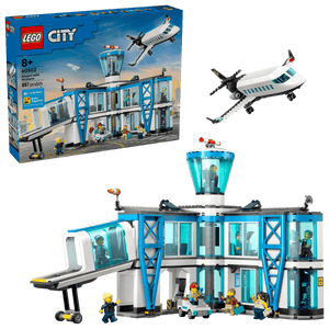 The LEGO® City Airport with Airplane by Legos - Toyhouse includes a terminal, control tower, jet plane, and figures—an exciting airport toy and airplane building kit with box packaging shown in the background.