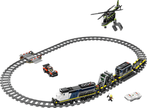 The Legos - Toyhouse LEGO® City Police Train Heist set includes an oval track, blue and white police train with two cars, a red car, helicopter, railroad crossing, two minifigures, and two remote controls.