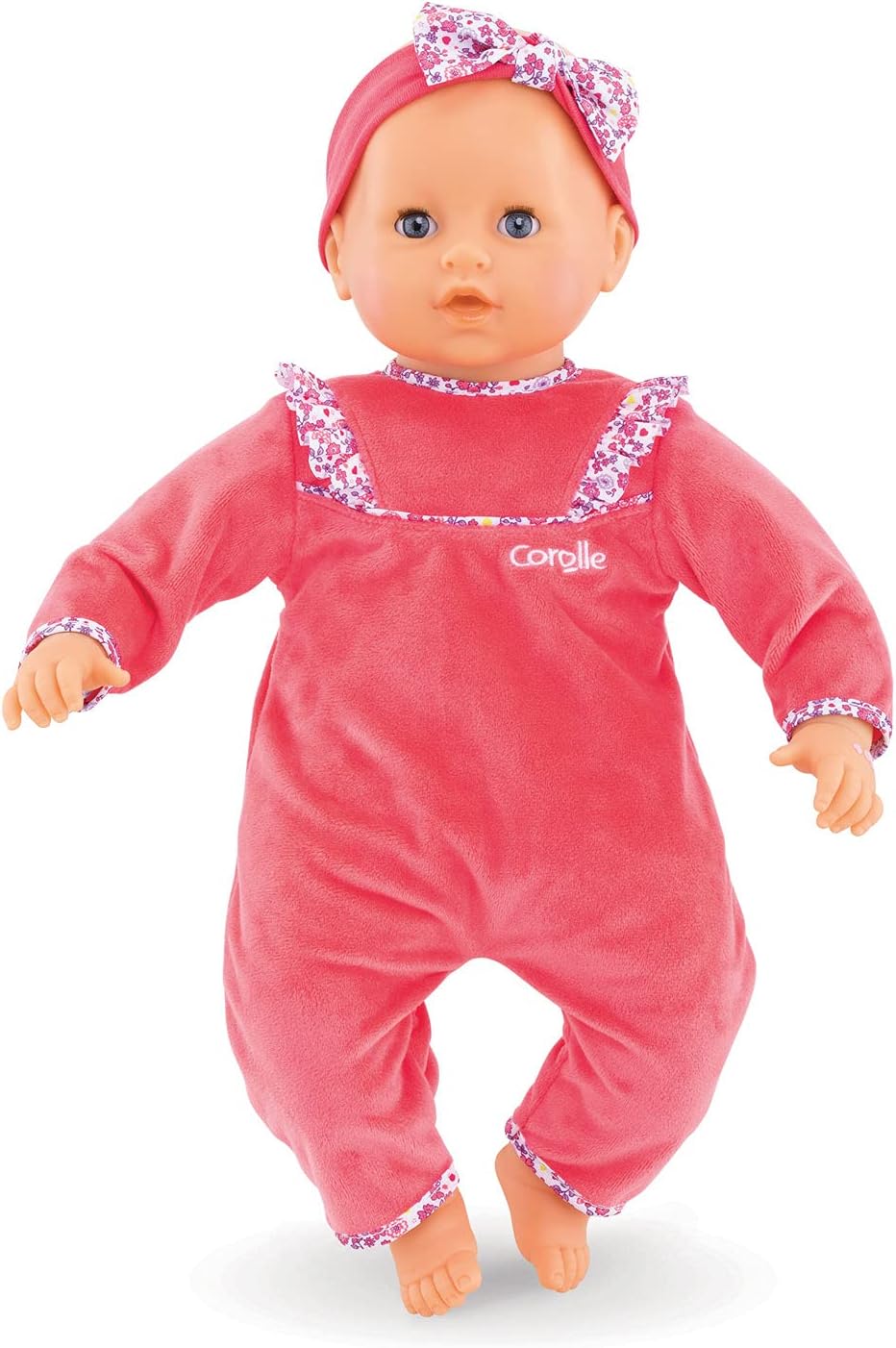 The Corolle Lila Chérie 17" doll is a large soft-touch vinyl baby wearing a pink floral-trimmed one-piece and matching headband with "Corolle" on the chest—perfect for cuddles and imaginative play.