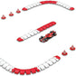 Maisto R/C 1:41 DC Ferrari SF-24 (2024) toy racecar on a matching track with barriers and traffic cones, viewed from above against a white background.