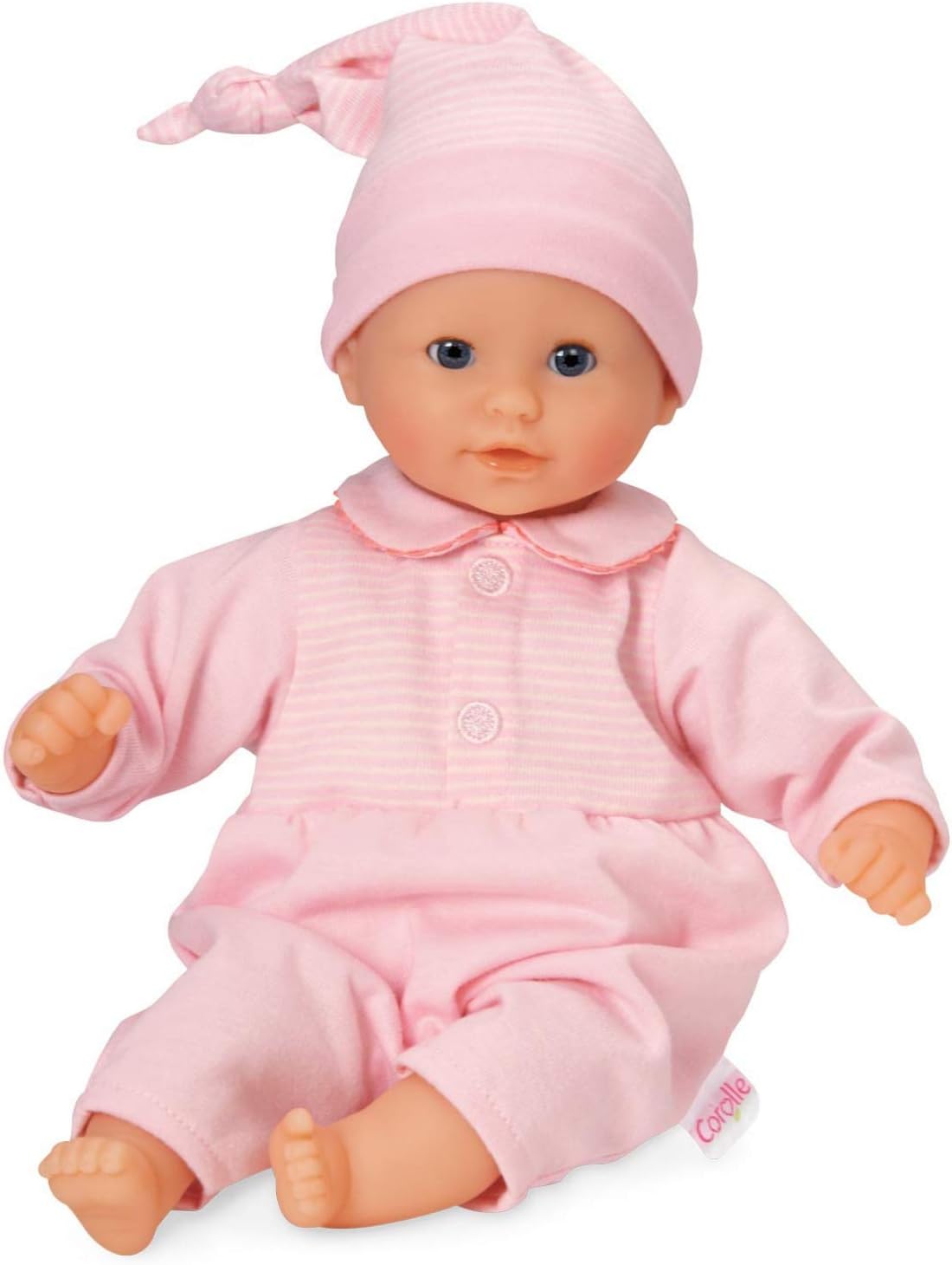 The Corolle Bebe Calin - Charming Pastel 12" baby doll wears a cute pink outfit and matching hat, sits upright with hands and feet visible—an ideal first doll for little ones.