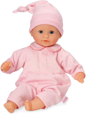 The Corolle Bebe Calin - Charming Pastel 12" baby doll wears a cute pink outfit and matching hat, sits upright with hands and feet visible—an ideal first doll for little ones.