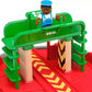 The BRIO World Turntable & Figure features a green platform with a small figure on top. Its red base includes elements from the BRIO World railway, such as track splits, wooden pillars, and smooth track connections for imaginative and versatile play.