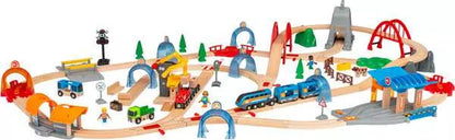 The BRIO World Action Tunnel Deluxe Set by Brio is a vibrant wooden railway ensemble featuring tracks, bridges, and an array of miniature figures and vehicles arranged in a playful landscape for unlimited railway excitement. Enhance your adventure with the included Action Tunnel, incorporating Smart Tech Sound for an immersive experience.