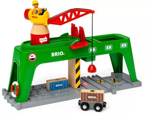 A wooden toy crane with a train and a truck, perfect for transporting shipping containers.