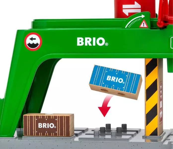 A green toy truck with a brio sign on it, perfect for railway enthusiasts.