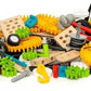 A vibrant pile of colorful parts from the BRIO Builder Activity Set—gears, wheels, beams, and connectors—lay scattered on a white background, inviting endless possibilities for open-ended construction play. Perfect for the Brio enthusiast eager to unleash their creativity.