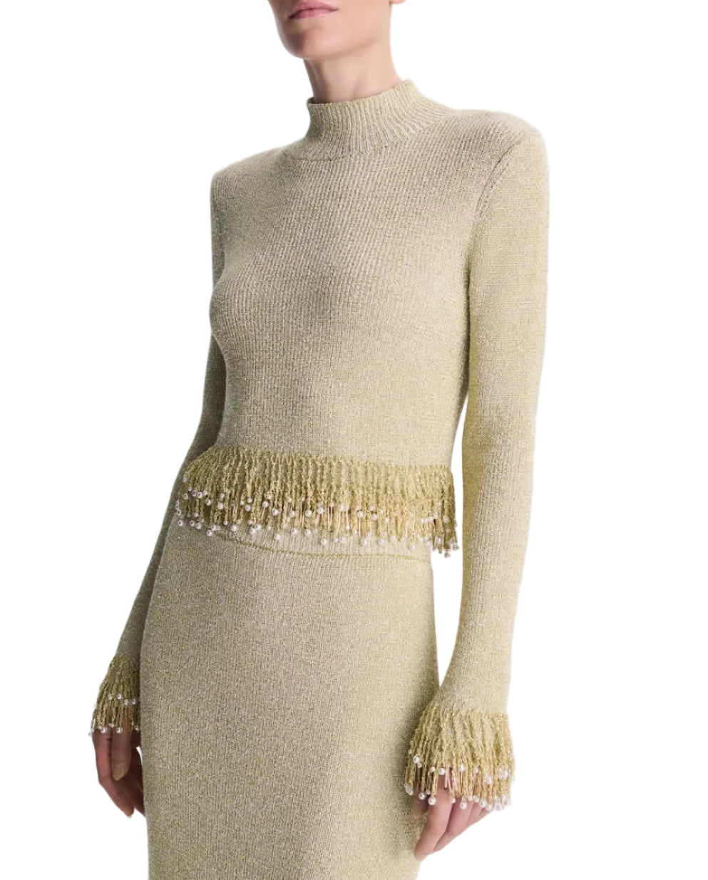 Simkhai Tali Pearl Fringe Top in a long-sleeved, high-neck metallic bouclé knit with a pearl fringe hem and cuffs.