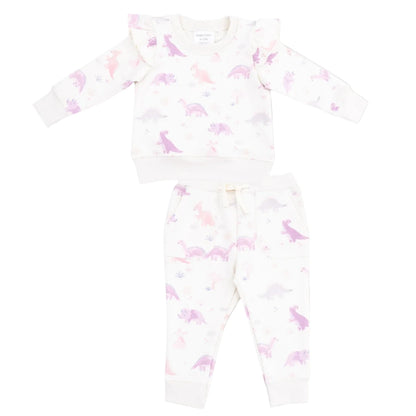 The Angel Dear Baby Girls' and Girls' French Terry Ruffle Sweatshirt and Jogger Pant set features a pastel pink and purple dinosaur print on soft, white fabric, with a long-sleeve ruffle top and comfy joggers.