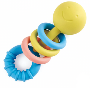 The "Rattling Rings Teether" by Hape is a vibrant baby rattle featuring a yellow smiley face on top and four interlocking, child-safe rings in blue, green, pink, and another shade of blue. It's ideal as a teething toy to soothe little ones.