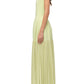 A woman stands in profile wearing the Simkhai Sandrine Dress, a strapless light yellow maxi with an elongated silhouette, fitted paneled bodice, and pleated skirt.