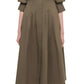 A person faces forward wearing the Simkhai Signature Jazz Dress, an olive green cotton poplin collared midi with an A-line silhouette and flared skirt, styled with beige sandals against a plain white background.