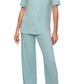 A person is barefoot in the Eberjey Gisele Short Sleeve Long Pant PJ Set by Eberjey, featuring light blue pajamas with a classic-fit top, short-sleeve button-up shirt, and low-rise straight leg pants with an elastic waistband.