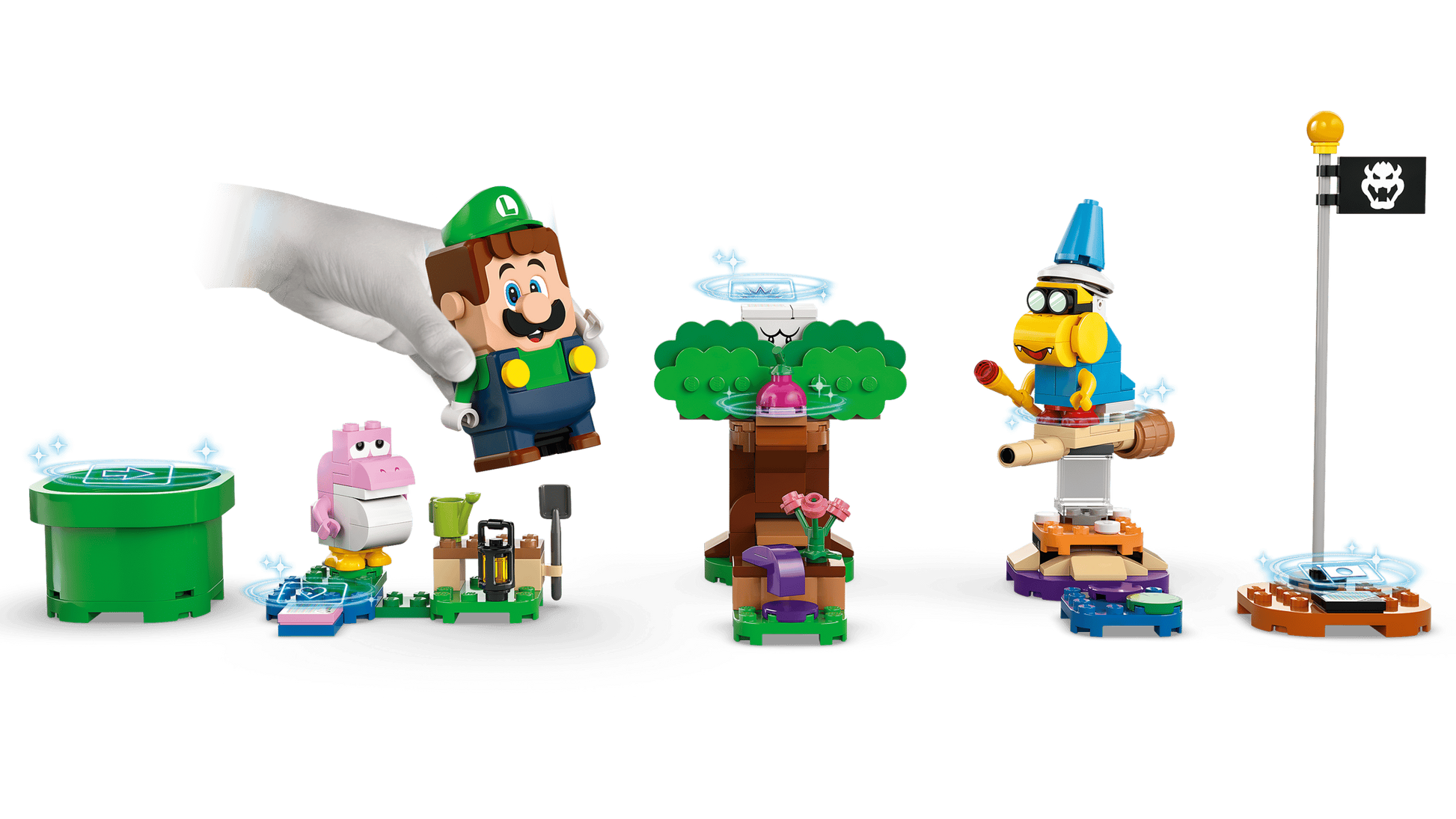 A hand holds a LEGO® Luigi™ figure above the LEGO® Super Mario™ Adventures set by Legos - Toyhouse, featuring characters, a tree, enemy, and flag—an ideal Nintendo gift for fans.