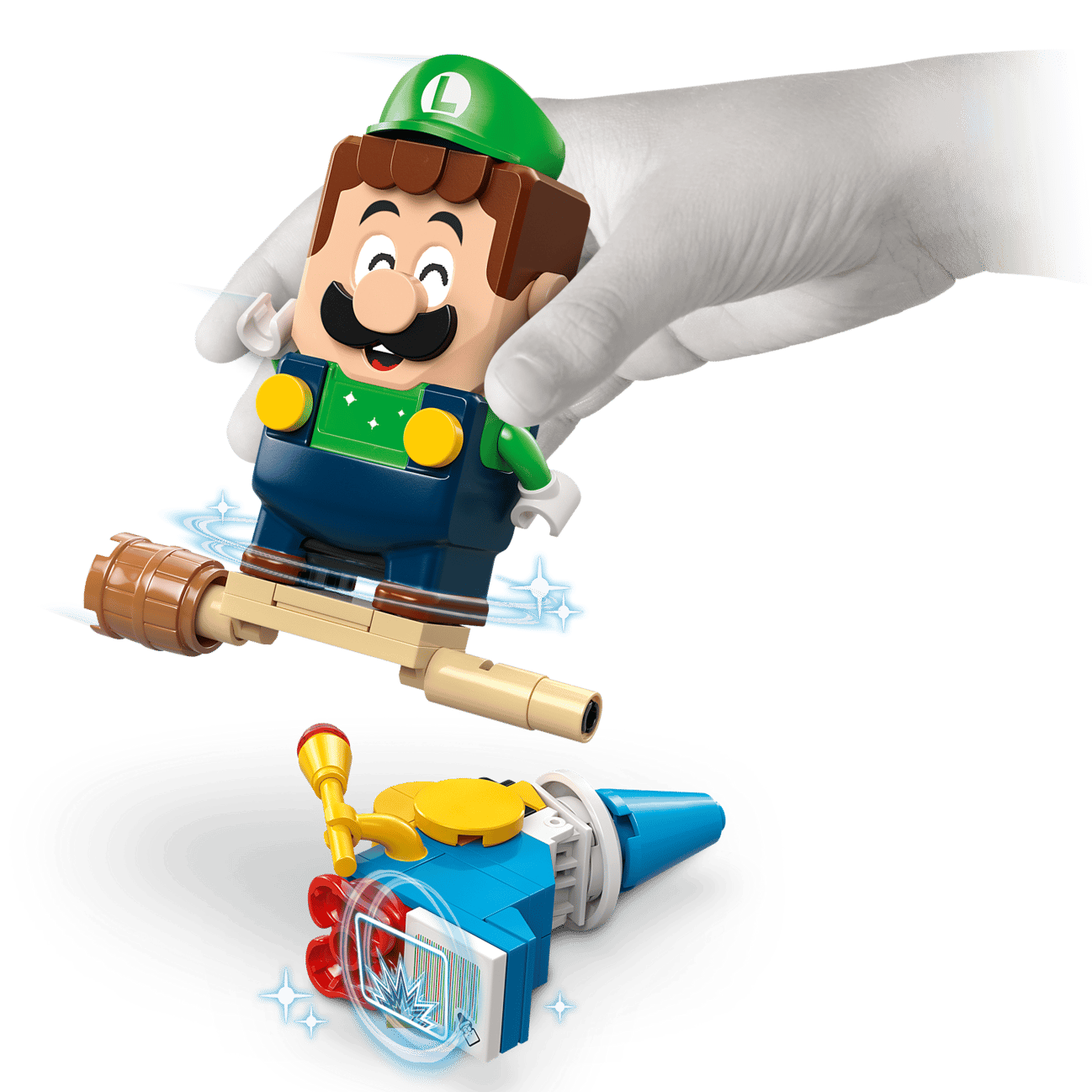 A gloved hand holds the LEGO® Super Mario™ Adventures with Interactive LEGO® Luigi™ by Legos - Toyhouse, featuring Luigi on a broomstick above a blue character—an ideal gift for Nintendo fans and unique LEGO collectors.