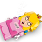 LEGO® Super Mario™ Adventures with Interactive LEGO® Peach™ by Legos - Toyhouse features a Princess Peach figurine lying down with eyes closed, wearing a pink dress and crown, with "ZZZ" symbols above her head.
