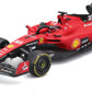 A red Maisto R/C 1:24 Ferrari SF-23 (2023) race car, featuring the number 16 and authentic sponsor branding such as Shell and Santander, is displayed against a white background. This impressive remote control car is a detailed Formula 1 replica that faithfully mirrors the real Ferrari SF-23 racing machine.