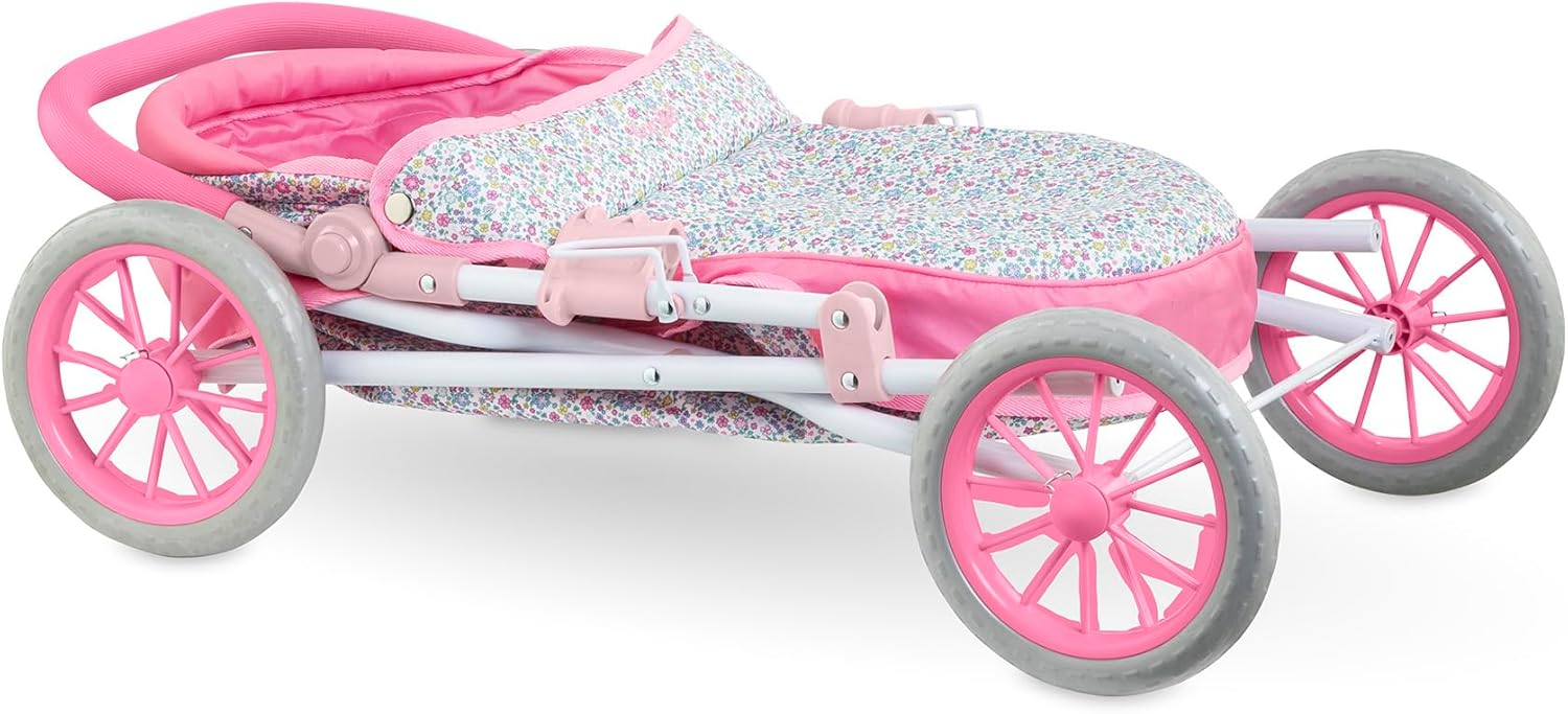 The Corolle Carriage - Bright Pink Floral is a folded baby doll stroller with a pink and white floral pattern, four wheels, and a curved, height-adjustable handlebar.
