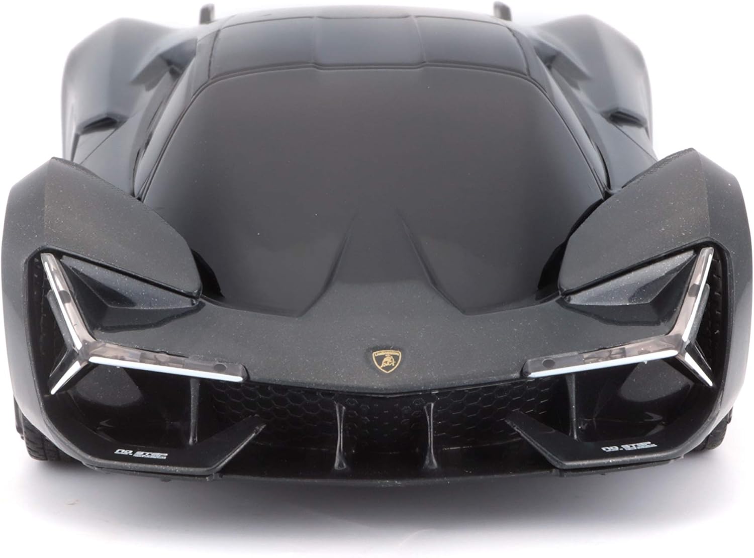 Front view of the Maisto R/C 1:24 Lamborghini Terzo Millennio, a black radio control sports car featuring angular headlights and the Lamborghini emblem on the hood.