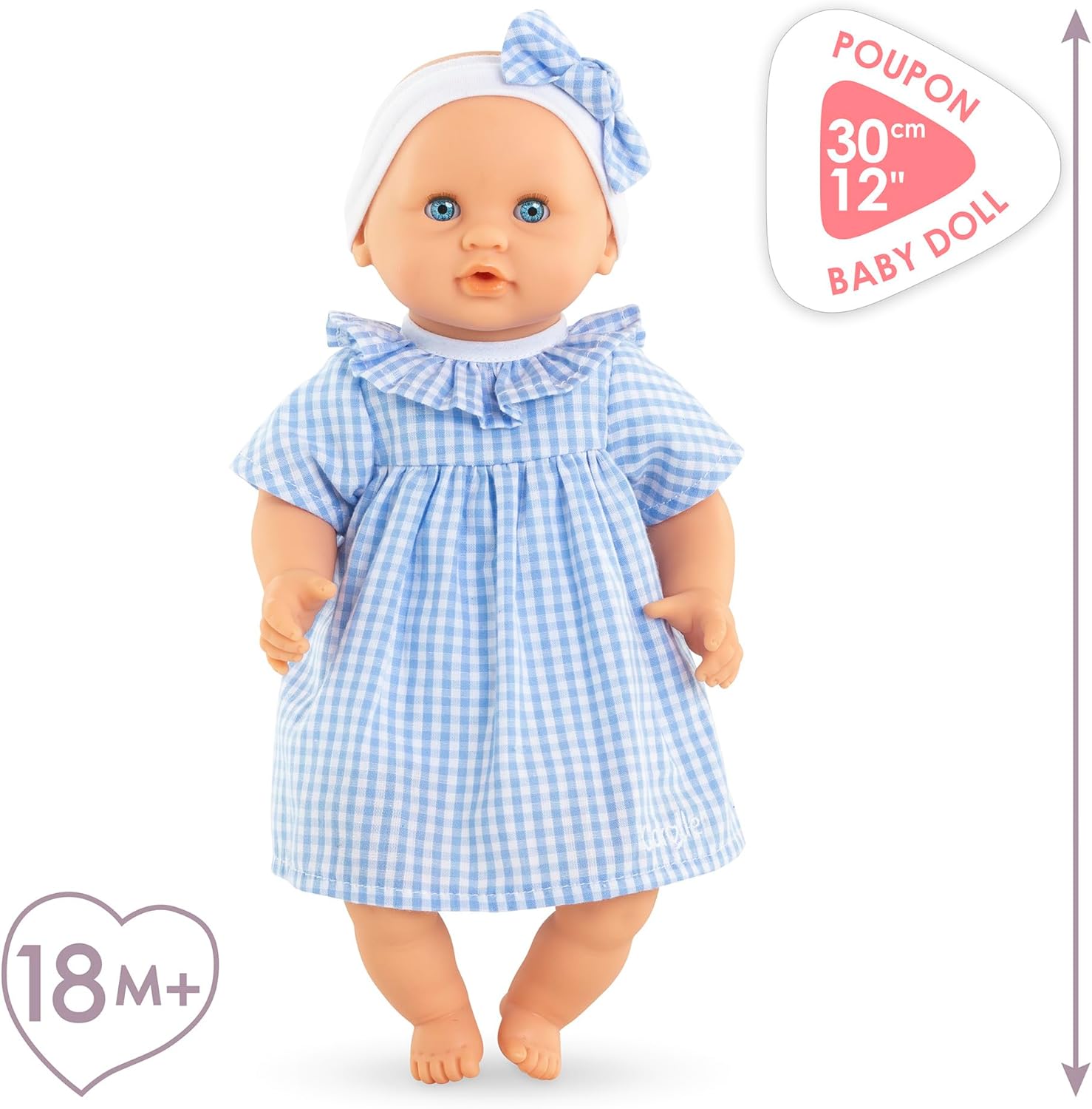 The Corolle Premier Calin - Milly Doll is a 12-inch soft-bodied baby doll with blue eyes, dressed in a blue and white gingham outfit and matching headband—ideal as a first doll for children 18 months and older.