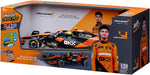 Box containing a 1:24 scale Maisto R/C McLaren MCL38—a thrilling radio control vehicle from Maisto—showcased in vibrant packaging featuring images of the actual car, driver Lando Norris, and highlights of the McLaren Team MCL38. Perfect for Formula Racing fans and collectors alike.