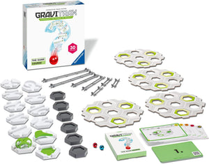 GraviTrax Go: Explosive by GraviTrax is shown with track pieces, hexagonal bases, metal rods, marbles, an instruction booklet, and its box arranged on a white background.