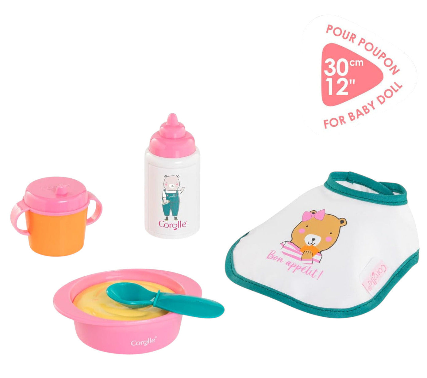 The Corolle Mealtime Set - Pink includes a bib, bottle, sippy cup, and bowl with spoon for dolls up to 12 inches—perfect for imaginative, nurturing play.
