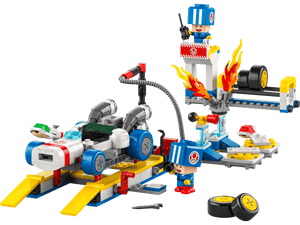 Legos - Toyhouse’s LEGO® Super Mario™ Mario Kart™ – Toad's Garage includes a B Dasher-inspired car, tools, spare wheels, flames, and two mechanic minifigures—ideal for LEGO Super Mario and Mario Kart fans.