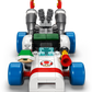 The Legos - Toyhouse LEGO® Super Mario™ Mario Kart™ – Toad's Garage features a model with blue wheels, red stripes, a mushroom emblem, and flaming exhaust pipes—perfectly resembling the iconic B Dasher.