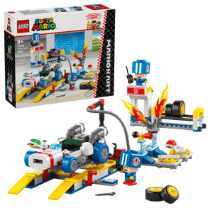 The LEGO® Super Mario™ Mario Kart™ – Toad's Garage set by Legos - Toyhouse features a garage scene with cars, including a B Dasher, figures, tools, accessories, and the set box in the background.