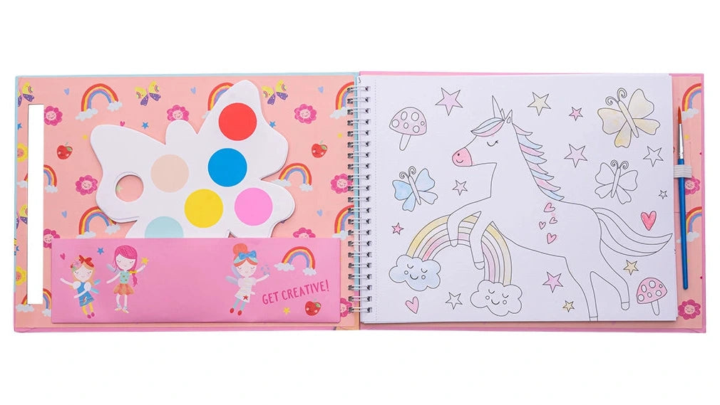 The Rainbow Fairy My Painting Pad by Floss and Rock is an open spiral-bound paint pad decorated with unicorns, rainbows, and butterflies, featuring a butterfly-shaped watercolor palette and a paintbrush on the left side.