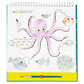 A drawing pad displays a vibrant underwater scene featuring a purple octopus with goggles, colorful fish, coral, and a paintbrush beneath the illustration—an ideal source of inspiration for the Floss and Rock Paint By Numbers - Ocean kit or any creative kids art project.