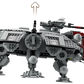 The LEGO® Star Wars AT-TE Walker is a four-legged, gray armored model with cannons and an upward-pointing arrow above its center.