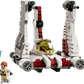 The Legos - Toyhouse LEGO® Star Wars™ V-19 Torrent Starfighter set features red and white accents, two blasters, and minifigures with lightsabers and blasters—an exciting building toy for kids.