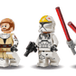 The LEGO® Star Wars™ V-19 Torrent Starfighter by Legos - Toyhouse includes three minifigures: one with a blue lightsaber, one helmeted with a blaster, and one pale figure with a red lightsaber—great for any collection.