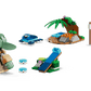 The Legos - Toyhouse LEGO® Star Wars™ Grogu's Homestead set includes a small Grogu figure, tropical scene with palm tree, blue slide, cauldron, marshmallow stick, two pink flamingos, and fun accessories on a white background.